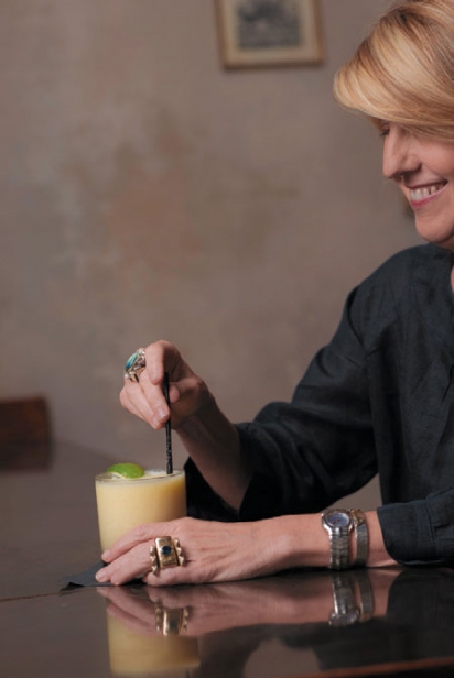 Ann Tuennerman holds a cocktail