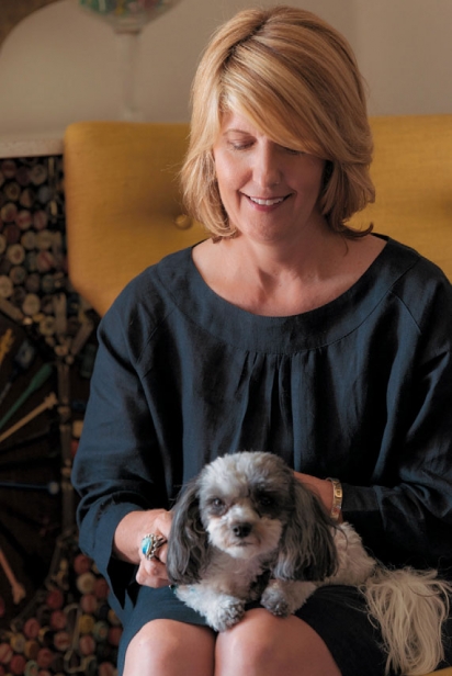 Ann Tuennerman with a puppy on her lap